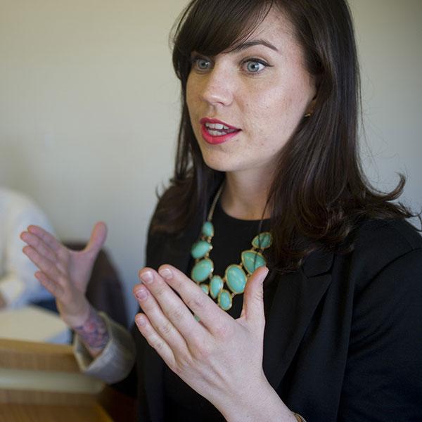 Female speaking at a podium